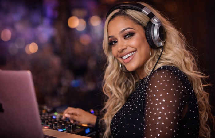 abby de la rosa performing as dj and media personality